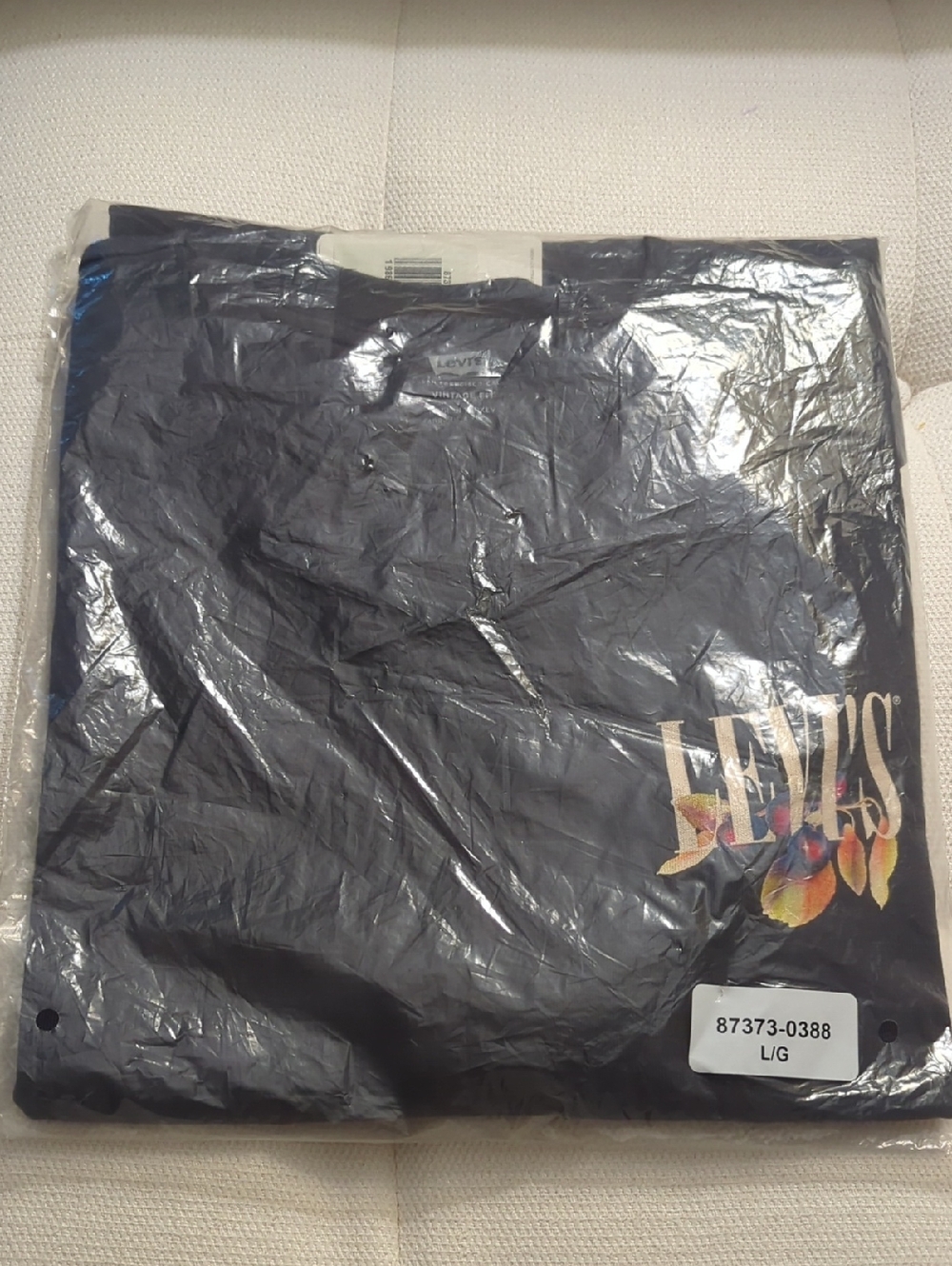 Levi's Black Tee with Colorful Floral Logo